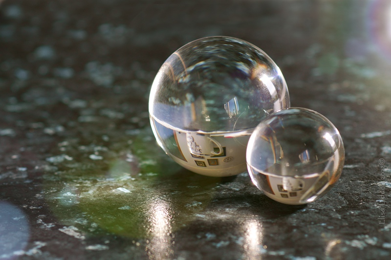 Two clear crystal balls